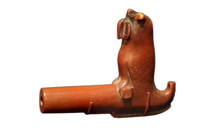 Carved catlinite owl pipe bowl close-up